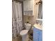 Bathroom with shower/tub and updated vanity at 255 Dolphin Pt # 511, Clearwater Beach, FL 33767