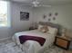 Bright bedroom with a queen-size bed and neutral decor at 255 Dolphin Pt # 511, Clearwater Beach, FL 33767