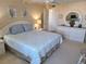 Spacious bedroom with a king-size bed and updated furnishings at 255 Dolphin Pt # 511, Clearwater Beach, FL 33767