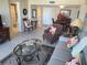 Living room, dining area, and view of bathroom at 255 Dolphin Pt # 511, Clearwater Beach, FL 33767