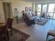 Spacious living room with tiled floors and furniture at 255 Dolphin Pt # 511, Clearwater Beach, FL 33767