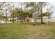 Community backyard with trees and other homes at 2722 Sand Hollow Ct # 2722, Clearwater, FL 33761