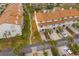 Aerial view of townhouse community showing building and landscaping at 274 Madeira Cir, St Petersburg, FL 33715
