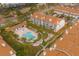 Condo complex with pool and tennis court nearby at 274 Madeira Cir, St Petersburg, FL 33715