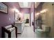Spa-like bathroom with double vanity, granite countertop, and large walk-in shower at 274 Madeira Cir, St Petersburg, FL 33715