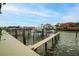 Community boat docks with multiple slips and walkways at 274 Madeira Cir, St Petersburg, FL 33715