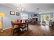 Elegant dining area with hardwood floors and a piano at 274 Madeira Cir, St Petersburg, FL 33715