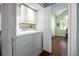 Convenient laundry room with washer, dryer, and overhead cabinets at 274 Madeira Cir, St Petersburg, FL 33715