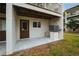 Private patio with exterior door and AC unit at 274 Madeira Cir, St Petersburg, FL 33715