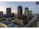 Cityscape aerial view at dusk, featuring high-rise buildings and city lights at 301 1St S St # 1905, St Petersburg, FL 33701