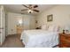 Spacious bedroom with a king-size bed and en-suite bathroom at 3048 Orchard Dr, Palm Harbor, FL 34684