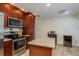 Well-equipped kitchen with stainless steel appliances and an island at 3048 Orchard Dr, Palm Harbor, FL 34684