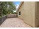 Brick paved patio with a view of the backyard at 3048 Orchard Dr, Palm Harbor, FL 34684