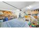 Finished garage with plenty of storage and a sitting area at 3113 Chamblee Ln, Clearwater, FL 33759