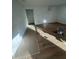 Unfinished basement with new wood flooring at 3307 W Oak Ave, Plant City, FL 33563