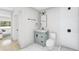 Clean bathroom with subway tile, vanity, and shower at 3307 W Oak Ave, Plant City, FL 33563