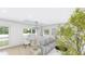 Bright dining area with large windows and modern light fixture at 3307 W Oak Ave, Plant City, FL 33563