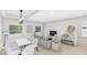Bright living room features hardwood floors, dining area, and ample natural light at 3307 W Oak Ave, Plant City, FL 33563