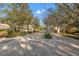 Gated community entrance with landscaping and guard house at 4112 Walden View Dr, Brandon, FL 33511