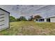 Large backyard with shed and screened patio at 4411 Mongite Rd, North Port, FL 34287