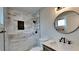 Updated bathroom features stylish tile and modern fixtures at 4411 Mongite Rd, North Port, FL 34287