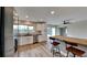 Modern kitchen with white shaker cabinets, stainless steel appliances, and butcher block countertops at 4411 Mongite Rd, North Port, FL 34287