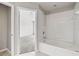 Clean bathroom with a bathtub and shower combination at 4842 Pond Ridge Dr, Riverview, FL 33578