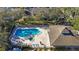 Community pool and spa with lounge chairs at 5100 Burchette Rd # 3204, Tampa, FL 33647