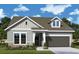 Attractive one-story home with gray siding and stone accents at 5283 Everlong Dr, Apollo Beach, FL 33572