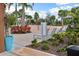 Refreshing water features with lounge chairs and lush landscaping at 5283 Everlong Dr, Apollo Beach, FL 33572