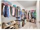 Large walk-in closet with ample shelving and hanging space at 5328 Stoic Vale Dr, Wimauma, FL 33598
