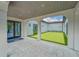 Private courtyard with lush green landscaping at 5328 Stoic Vale Dr, Wimauma, FL 33598