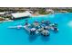Inflatable obstacle course in the crystal lagoon at 5328 Stoic Vale Dr, Wimauma, FL 33598