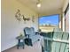 Covered patio with seating area and view of backyard at 5328 Stoic Vale Dr, Wimauma, FL 33598