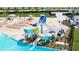 Dual water slide leading into a refreshing lagoon pool at 5328 Stoic Vale Dr, Wimauma, FL 33598