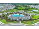 Aerial view of community pool and homes at 5640 Silver Moonlight Dr, Palmetto, FL 34221