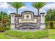 Attractive community entrance with stonework and water feature at 5640 Silver Moonlight Dr, Palmetto, FL 34221
