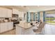 Spacious kitchen featuring granite countertops and stainless steel appliances at 5640 Silver Moonlight Dr, Palmetto, FL 34221