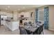 Open concept kitchen with granite countertops and a breakfast bar at 5640 Silver Moonlight Dr, Palmetto, FL 34221