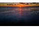 Sunset view over calm water with distant boats at 610 Indiana Ave, Crystal Beach, FL 34681