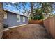 Spacious backyard with wood-chip ground cover at 6297 29Th N St, St Petersburg, FL 33702