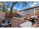 Private backyard with patio, string lights and seating at 6297 29Th N St, St Petersburg, FL 33702