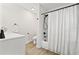 Clean bathroom with a shower/tub combo and white vanity at 6297 29Th N St, St Petersburg, FL 33702