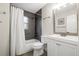 Bathroom with tub, shower, and white vanity at 6297 29Th N St, St Petersburg, FL 33702