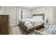 Cozy bedroom with a wooden bed frame and neutral color palette at 6297 29Th N St, St Petersburg, FL 33702