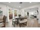 Bright dining area with a round table and view to living room at 6297 29Th N St, St Petersburg, FL 33702