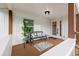 Relaxing front porch with bench and side tables at 6297 29Th N St, St Petersburg, FL 33702