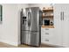 Stainless steel refrigerator with water dispenser in a modern kitchen at 6297 29Th N St, St Petersburg, FL 33702