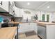 Modern kitchen with butcher block countertops and stainless steel appliances at 6297 29Th N St, St Petersburg, FL 33702