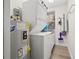 Laundry room with stackable washer and dryer, and water heater at 6297 29Th N St, St Petersburg, FL 33702